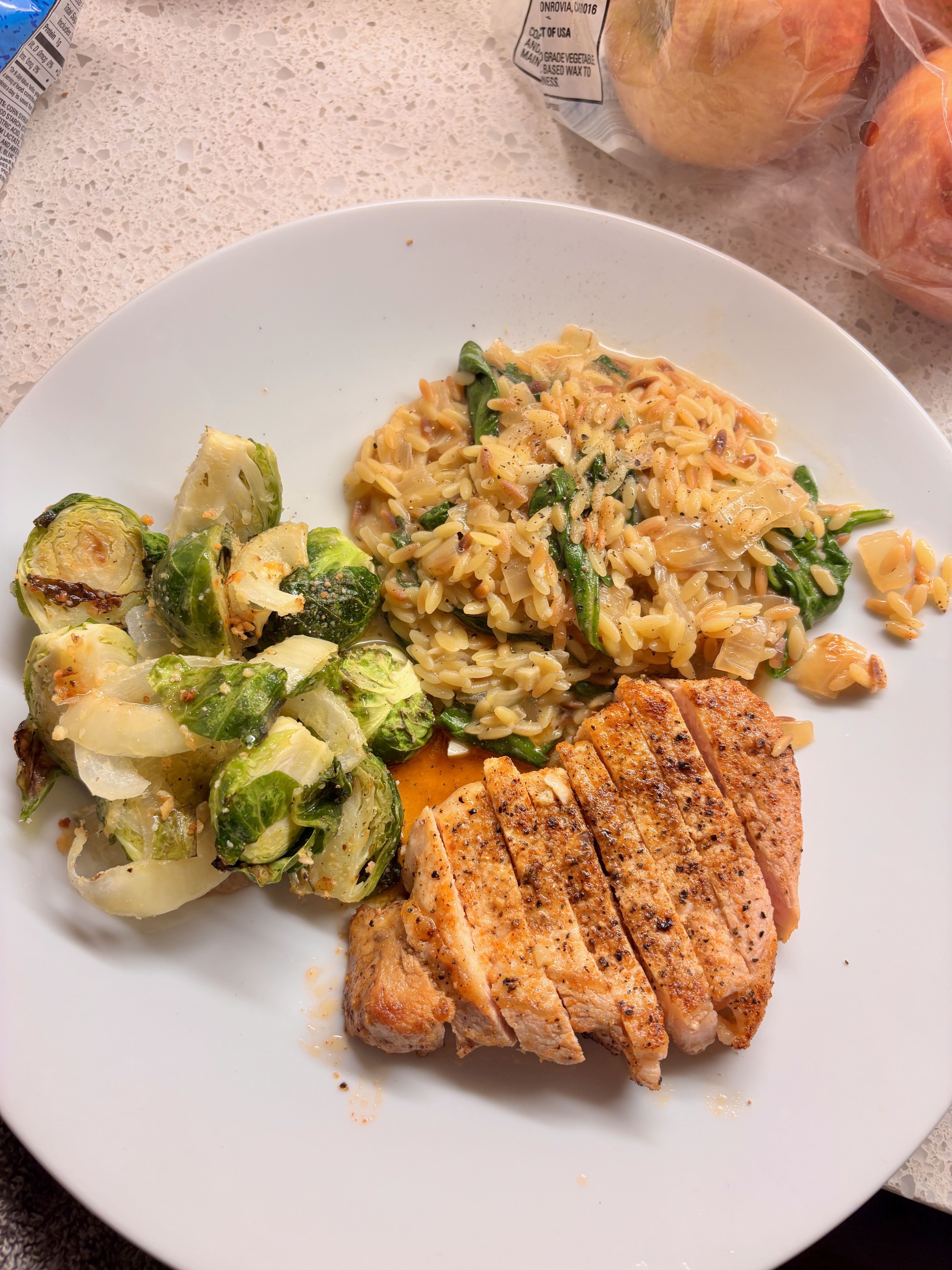 seared pork chop, creamy orzo & brussels