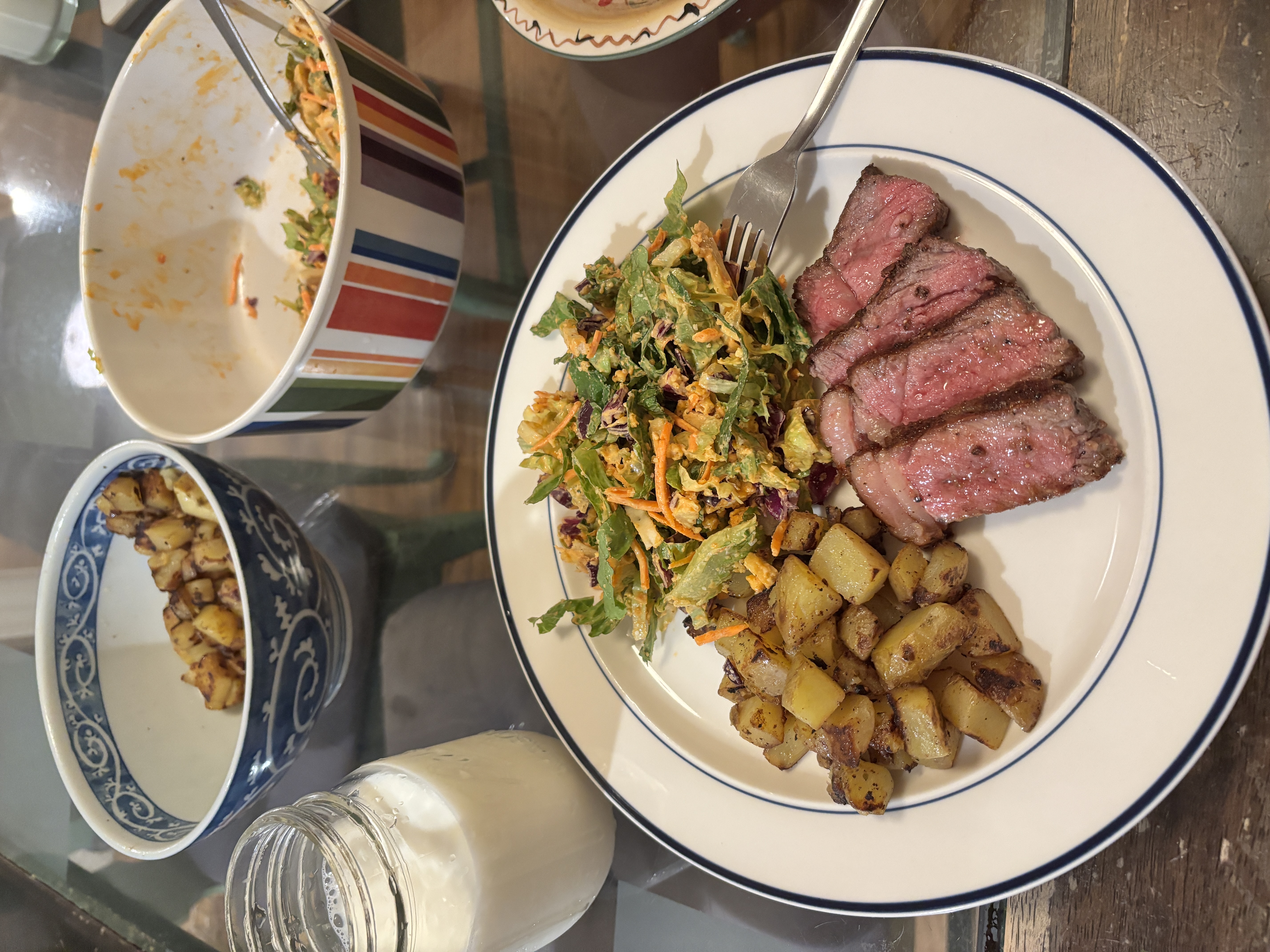 steak, crispy potatoes & chopped salad